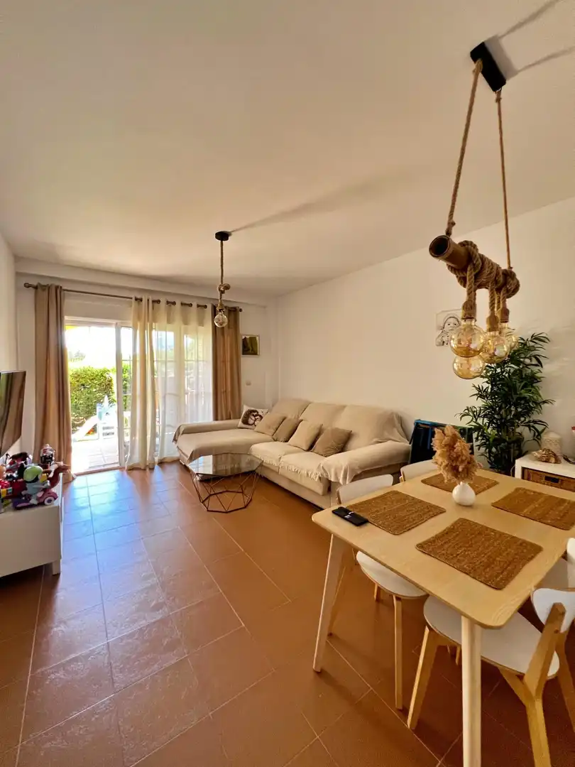 Sala d'estar de Apartament en venda en Ayamonte amb Jardí privat, Terrassa i Piscina comunitària