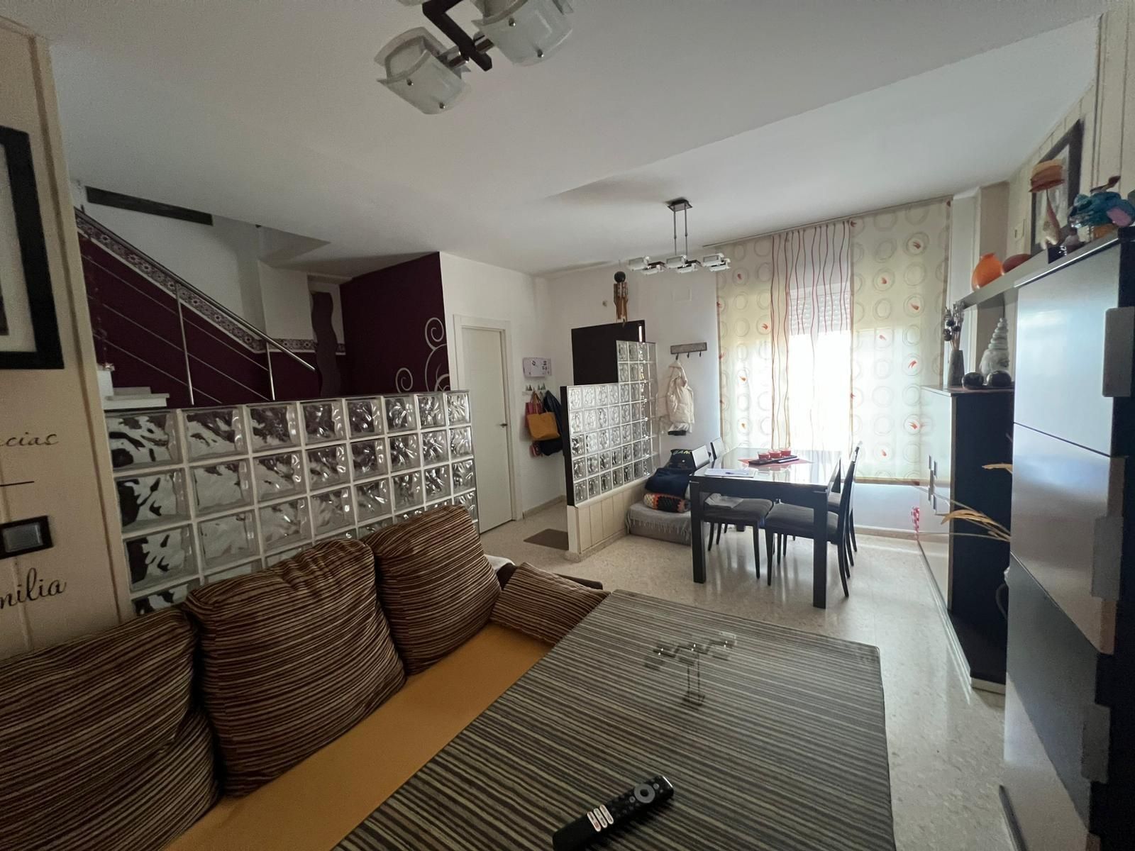 Living room of Single-family semi-detached for sale in La Algaba  with Air Conditioner, Storage room and Balcony