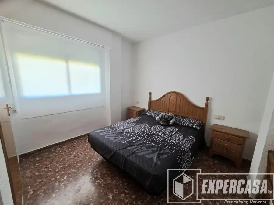 Dormitori de Apartament de lloguer en Cullera amb Terrassa, Piscina i Moblat