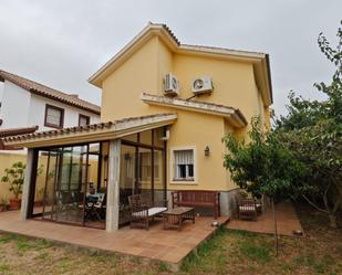 Exterior view of House or chalet for sale in Chiclana de la Frontera  with Air Conditioner, Heating and Private garden