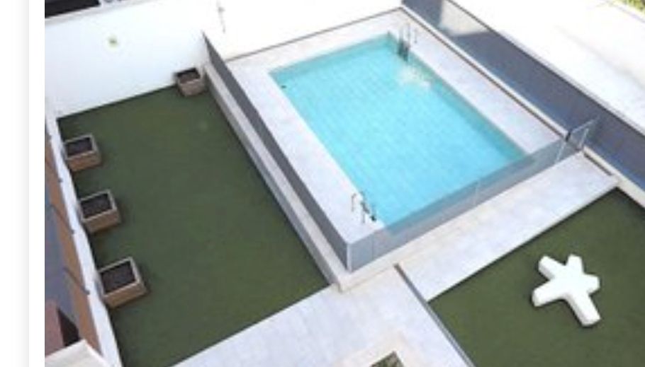 Swimming pool of Flat for sale in Badalona  with Air Conditioner, Heating and Parquet flooring