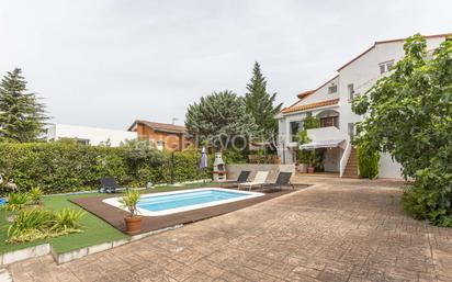 Exterior view of Single-family semi-detached for sale in Collado Villalba  with Air Conditioner and Swimming Pool