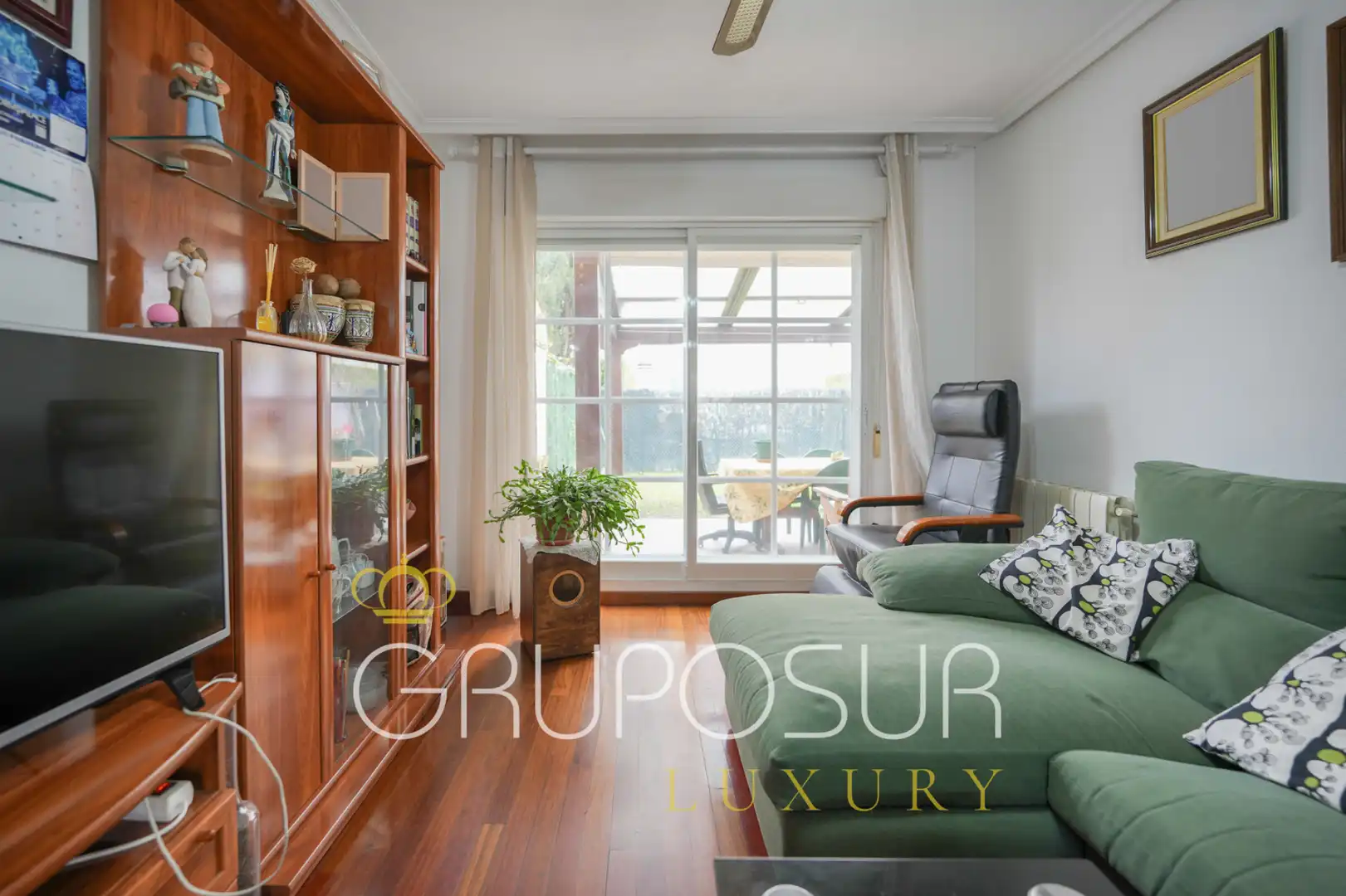 Sala de estar de Casa adosada en venta en Arroyo de la Encomienda con Calefacción, Jardín privado y Parquet