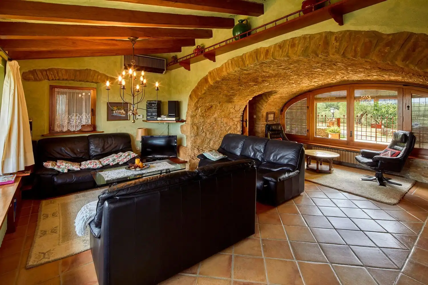 Sala de estar de Casa o chalet de alquiler en Madremanya con Aire acondicionado, Jardín privado y Terraza