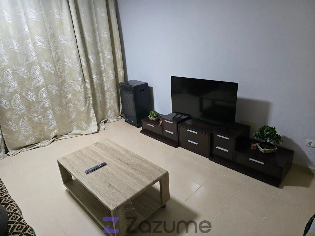 Sala d'estar de Àtic de lloguer en Villatobas amb Aire condicionat, Calefacció i Jardí privat