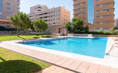 Swimming pool of Flat for sale in  Granada Capital  with Air Conditioner, Heating and Private garden