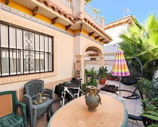 Jardí de Casa adosada en venda en Torrevieja amb Aire condicionat, Piscina i Piscina comunitària