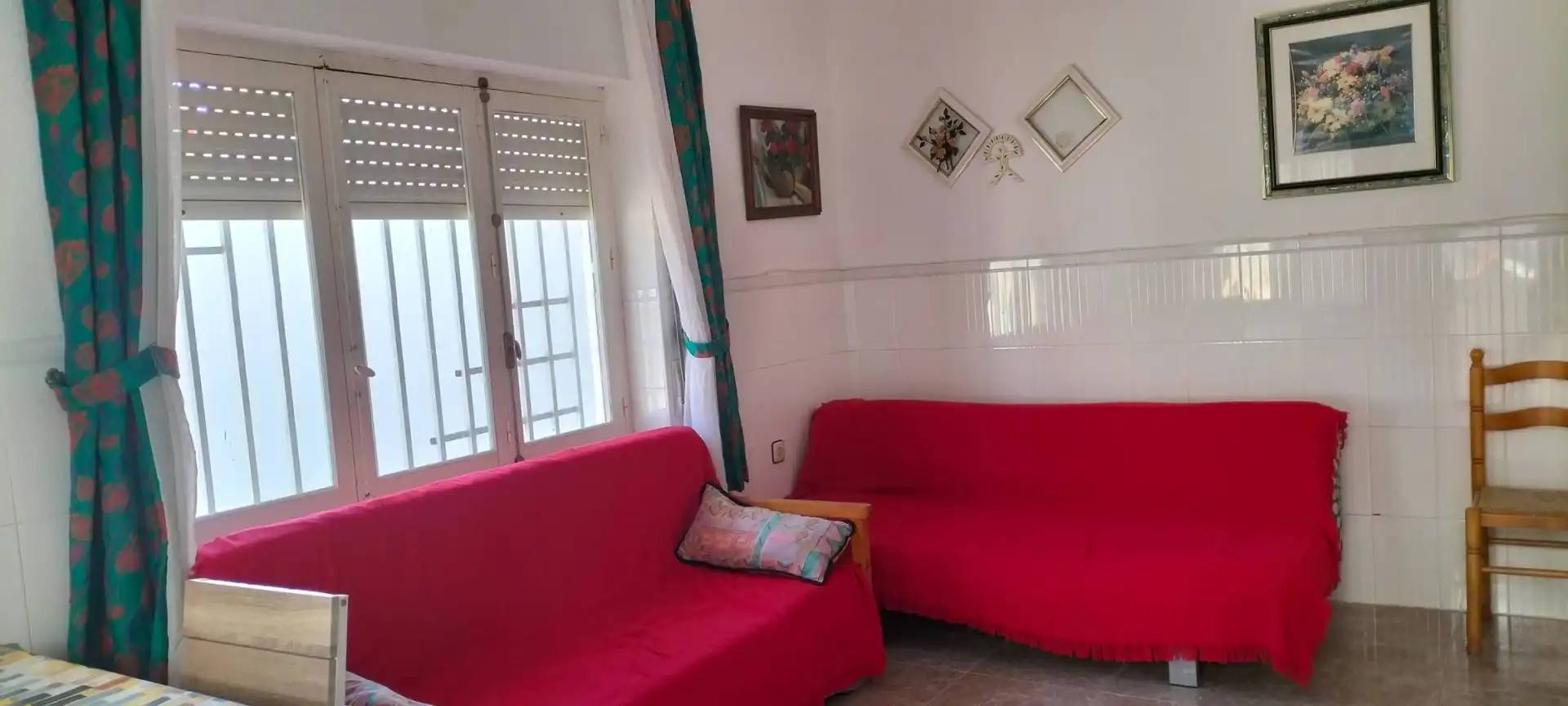 Sala d'estar de Casa adosada en venda en Pilar de la Horadada