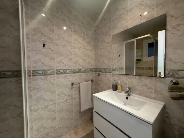 Badezimmer von Wohnung zum Verkauf in Vilassar de Dalt mit Heizung, Ofen und Balkon