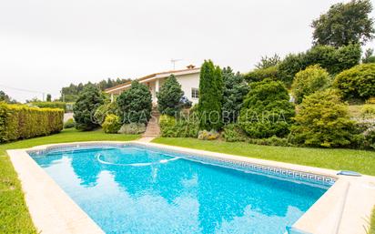 Exterior view of House or chalet for sale in Carral  with Swimming Pool