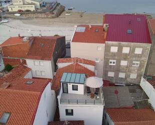 Vista exterior de Casa o xalet en venda en O Grove   amb Calefacció i Terrassa