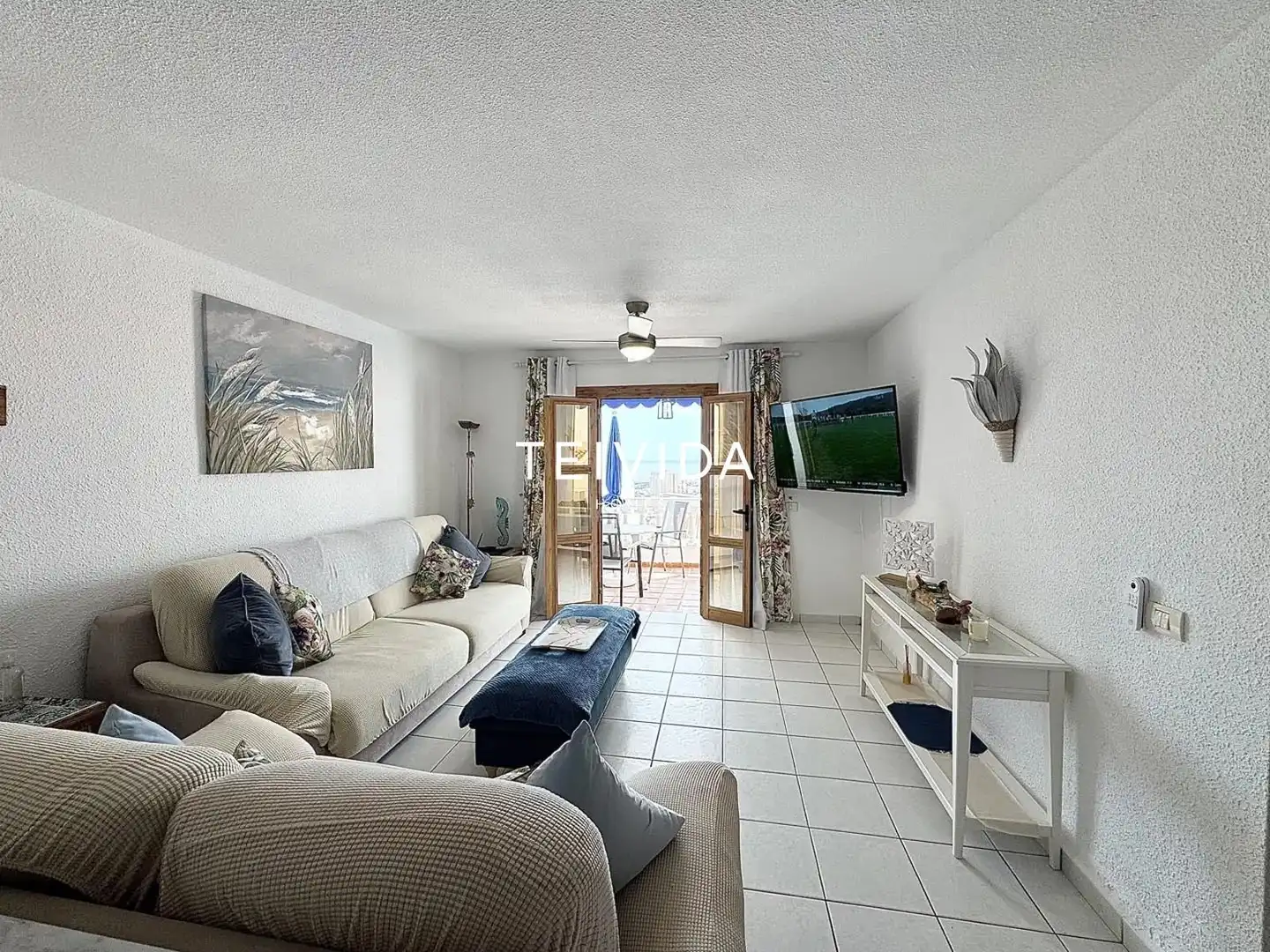 Sala de estar de Piso en venta en Arona con Terraza, Piscina y Piscina comunitaria