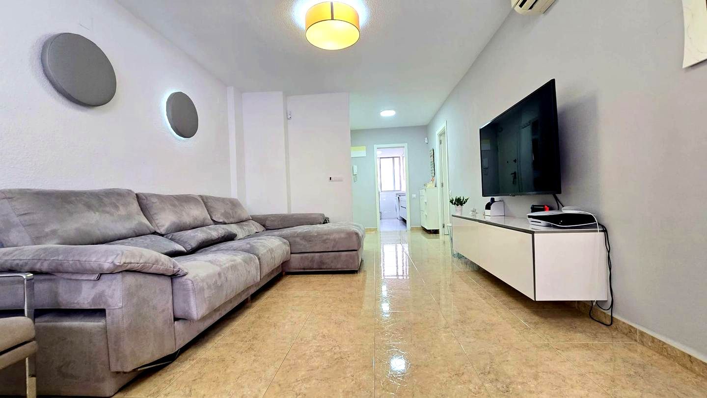 Living room of Flat for sale in Gandia  with Air Conditioner, Terrace and Furnished