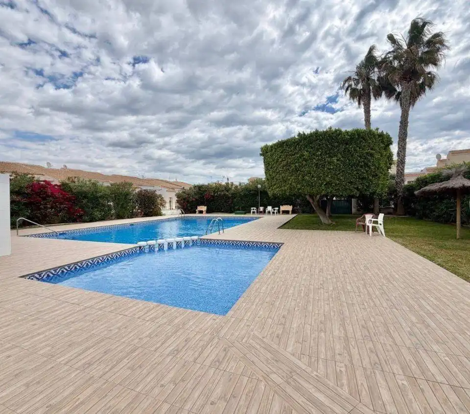 Piscina de Casa adosada en venda en Santa Pola amb Aire condicionat, Jardí privat i Terrassa
