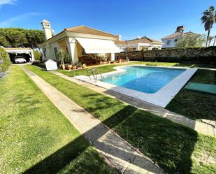 Swimming pool of House or chalet for sale in El Portil  with Heating, Private garden and Terrace