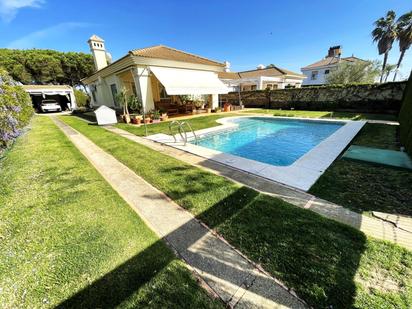 Piscina de Casa o xalet en venda en El Portil amb Calefacció, Jardí privat i Terrassa