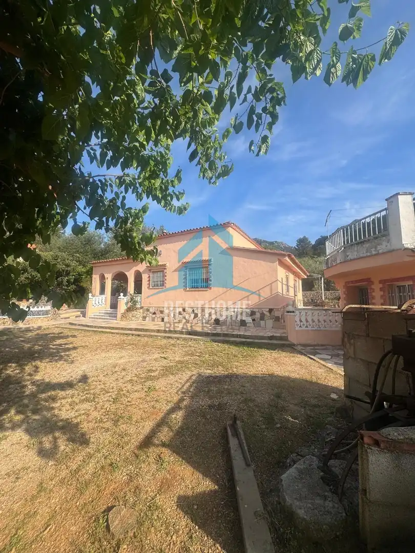 Vista exterior de Casa o xalet en venda en Quatretonda amb Aire condicionat, Jardí privat i Terrassa