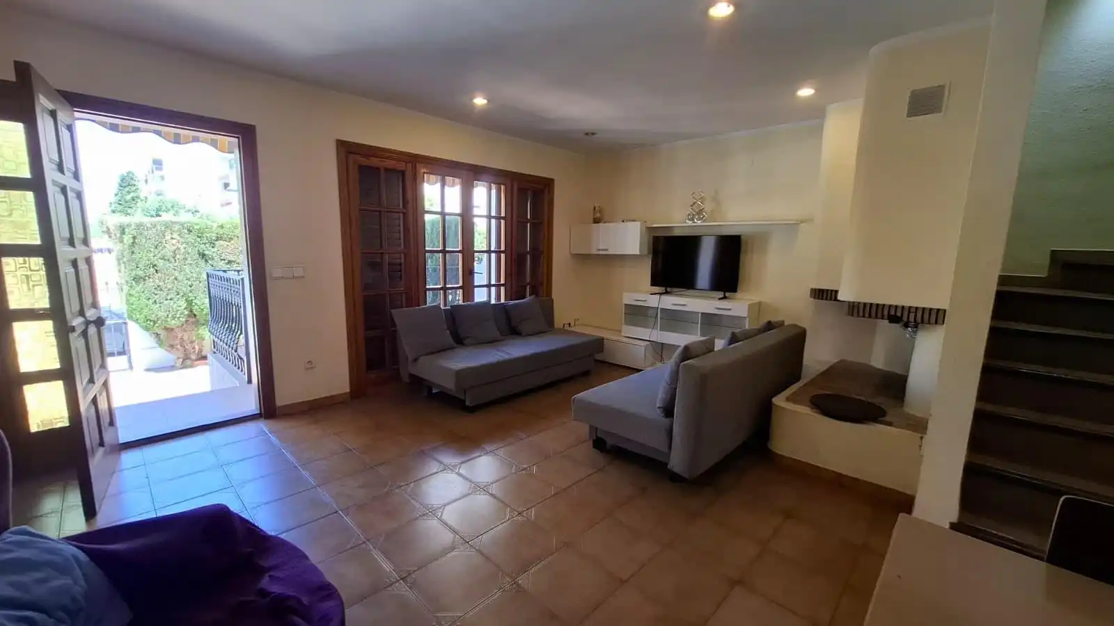 Sala d'estar de Casa o xalet de lloguer en La Pobla de Farnals amb Aire condicionat, Terrassa i Moblat