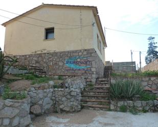 Exterior view of House or chalet for sale in Bigues i Riells  with Storage room