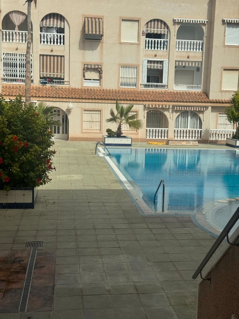 Swimming pool of Flat for sale in Torrevieja  with Furnished, Oven and Washing machine