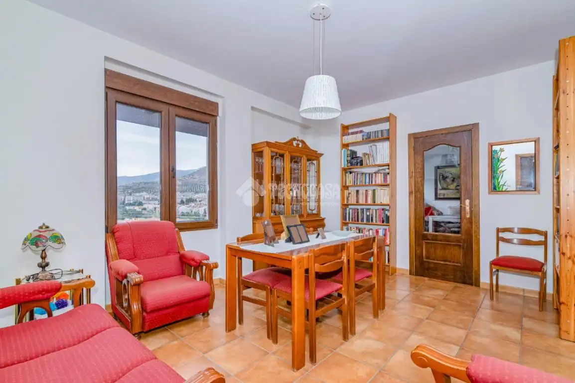 Sala d'estar de Casa adosada en venda en Loja amb Aire condicionat i Terrassa