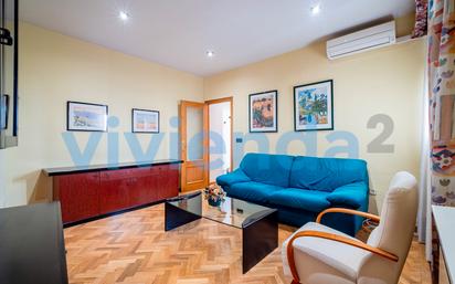 Living room of Flat for sale in  Madrid Capital  with Air Conditioner and Balcony