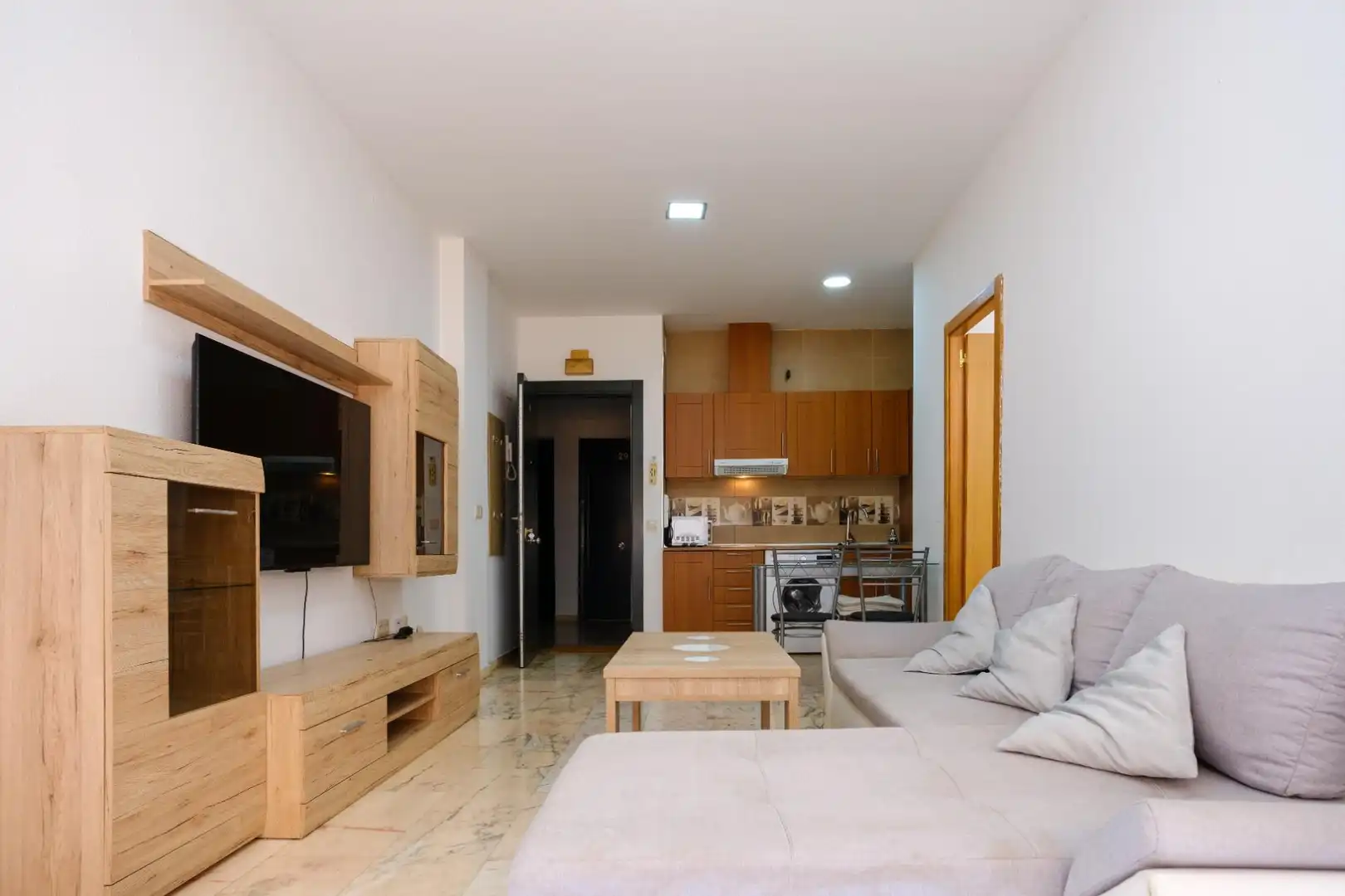 Sala d'estar de Apartament de lloguer en Sevilla amb Aire condicionat, Jardí privat i Moblat