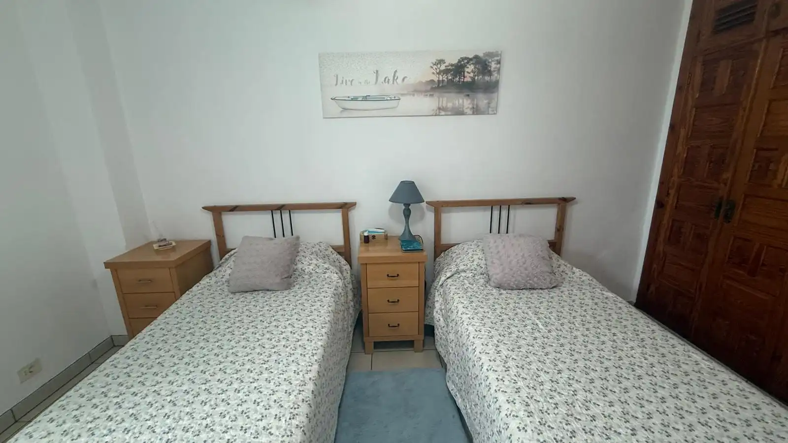 Schlafzimmer von Erdgeschoss zum Verkauf in Arona mit Privatgarten, Terrasse und Abstellraum