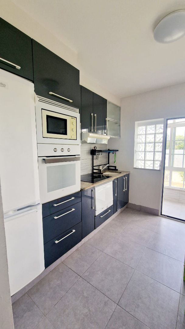 Kitchen of Flat for sale in Sanxenxo  with Heating, Private garden and Furnished