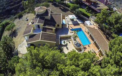 Vista exterior de Casa o xalet en venda en La Nucia amb Aire condicionat, Calefacció i Jardí privat