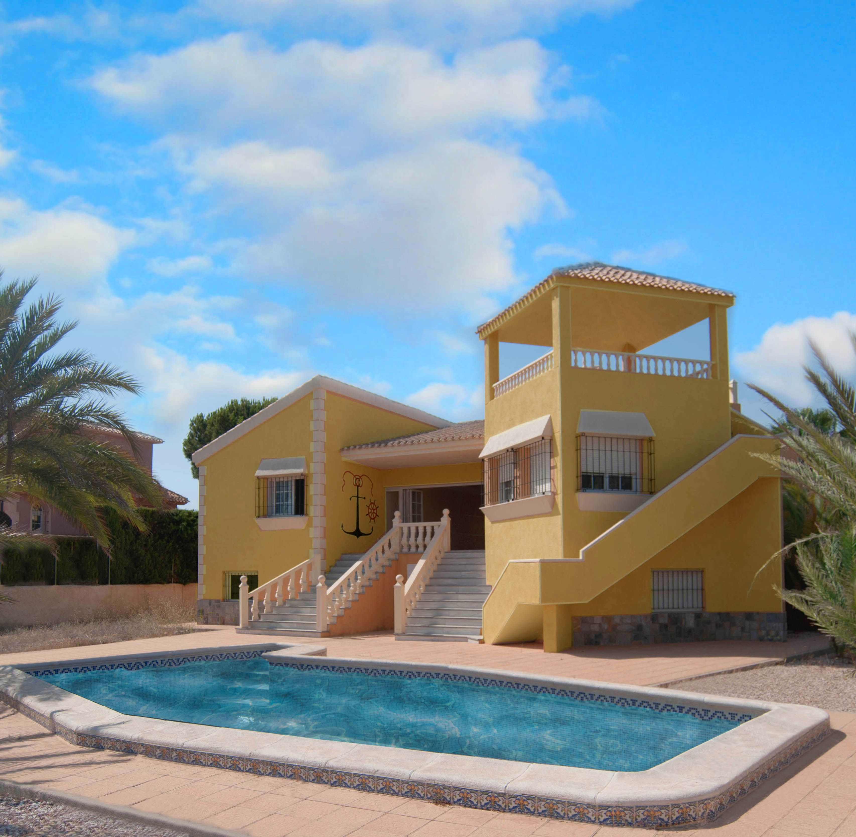 Vista exterior de Casa o xalet en venda en La Manga del Mar Menor amb Jardí privat i Piscina