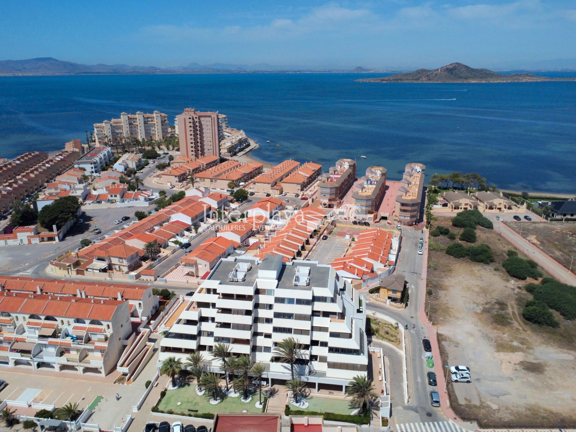 Exterior view of Single-family semi-detached for sale in La Manga del Mar Menor  with Air Conditioner, Private garden and Terrace