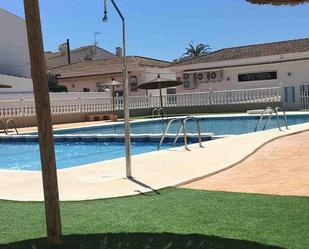 Piscina de Casa adosada de lloguer en Santa Pola amb Aire condicionat, Calefacció i Jardí privat