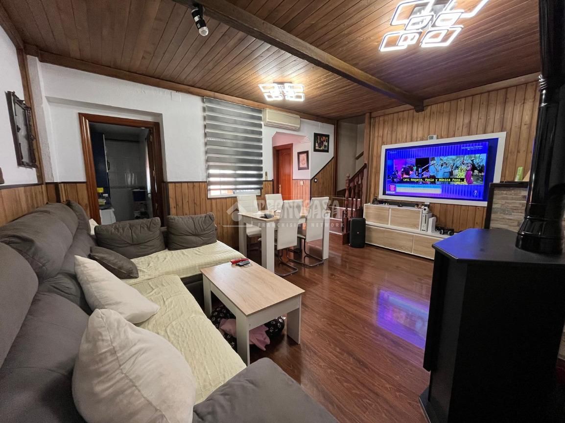 Sala de estar de Casa adosada en venta en Linares con Aire acondicionado y Terraza