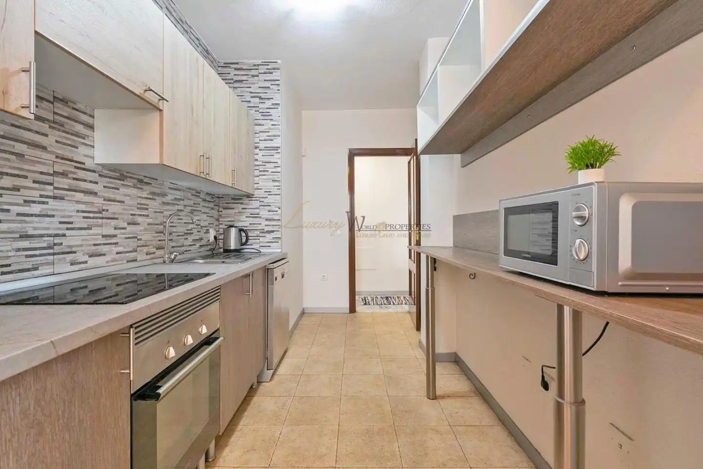 Cuina de Apartament en venda en Arona amb Terrassa, Traster i Moblat