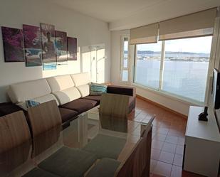 Sala d'estar de Pis de lloguer en Sanxenxo amb Terrassa, Moblat i Forn