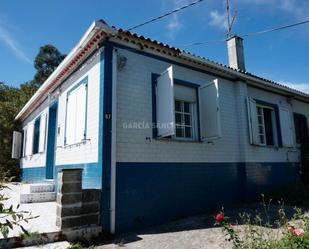 Exterior view of House or chalet for sale in A Pobra do Caramiñal  with Private garden, Terrace and Storage room