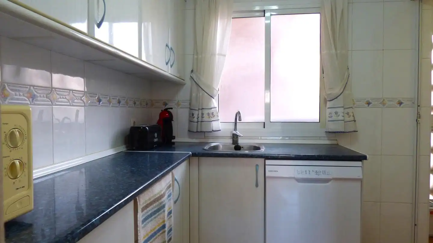 Kitchen of Flat for sale in Benidorm  with Air Conditioner, Furnished and Community pool
