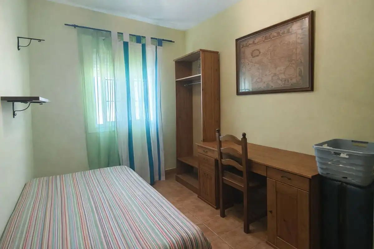 Dormitori de Casa adosada en venda en San Roque amb Aire condicionat, Jardí privat i Terrassa