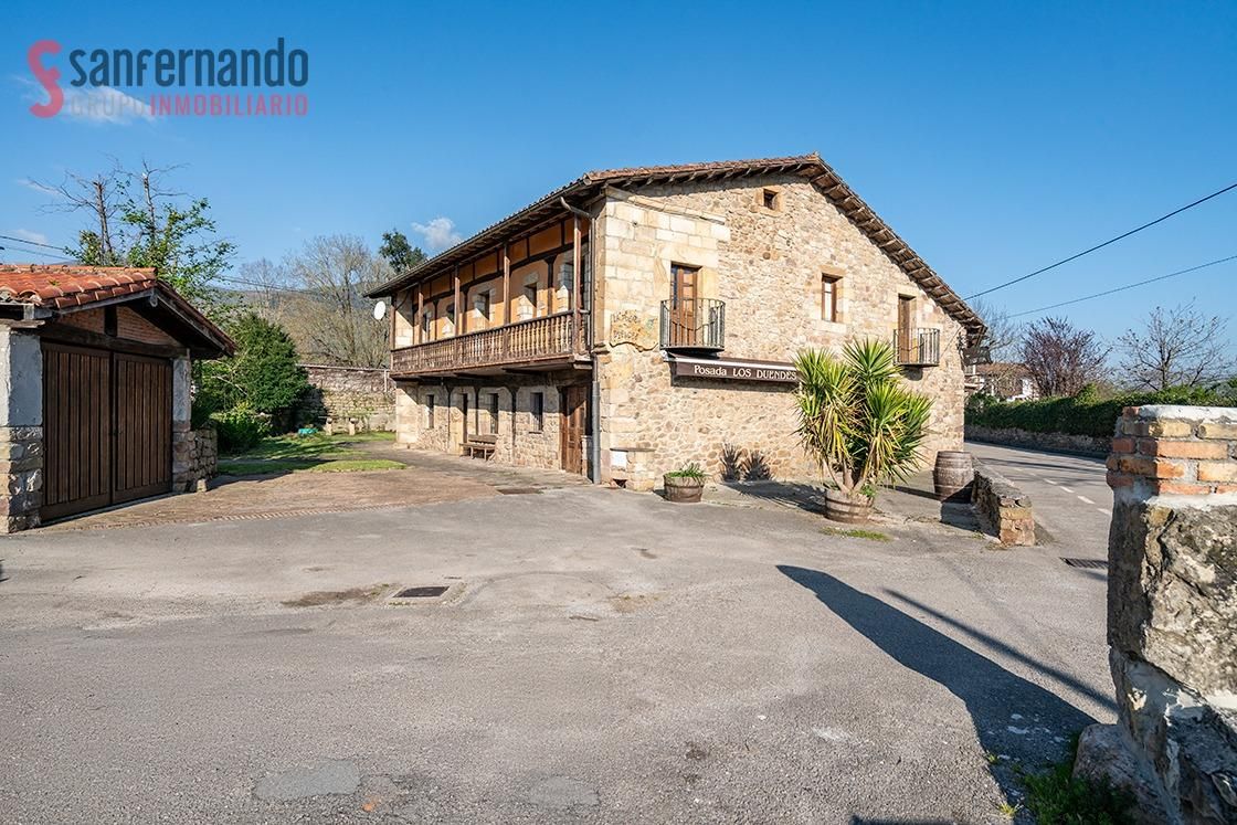 Vista exterior de Casa o xalet en venda en Molledo amb Calefacció, Jardí privat i Terrassa