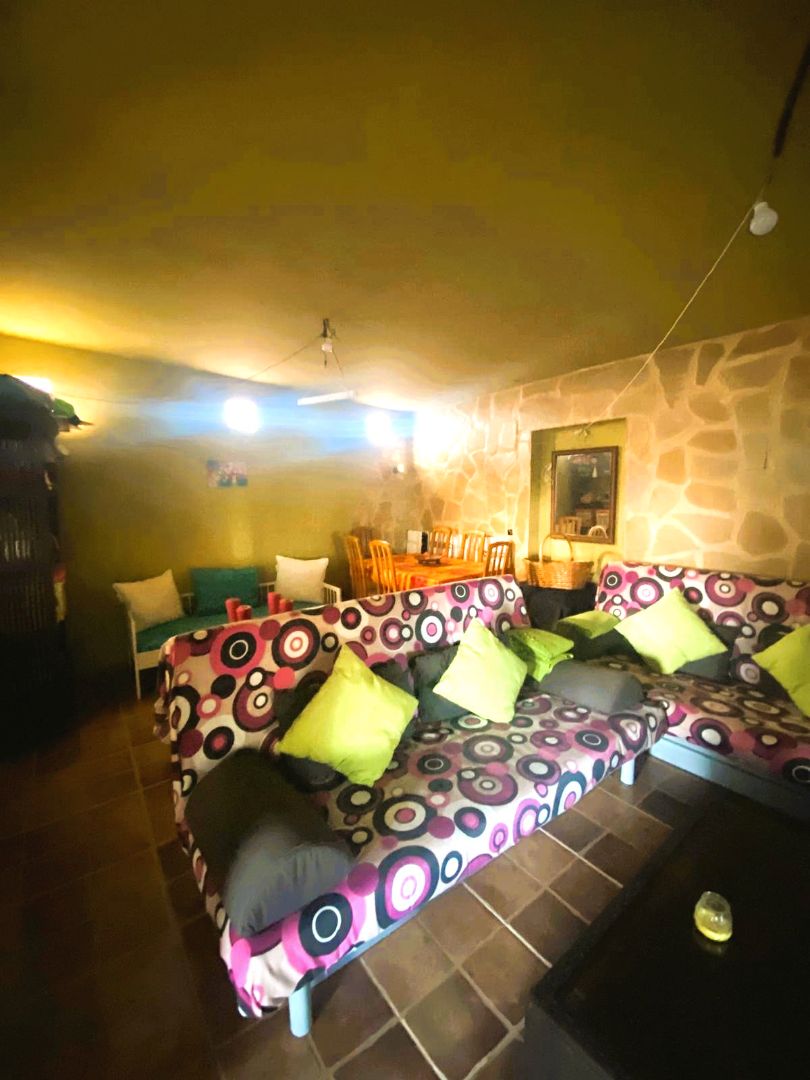 Sala d'estar de Finca rústica en venda en Sagunto / Sagunt amb Jardí privat, Terrassa i Moblat