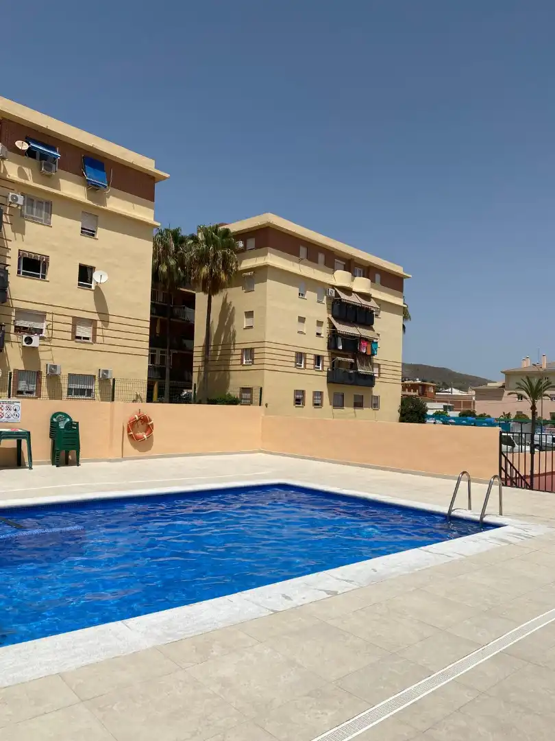 Swimming pool of Flat for sale in Arroyo de la Miel 
