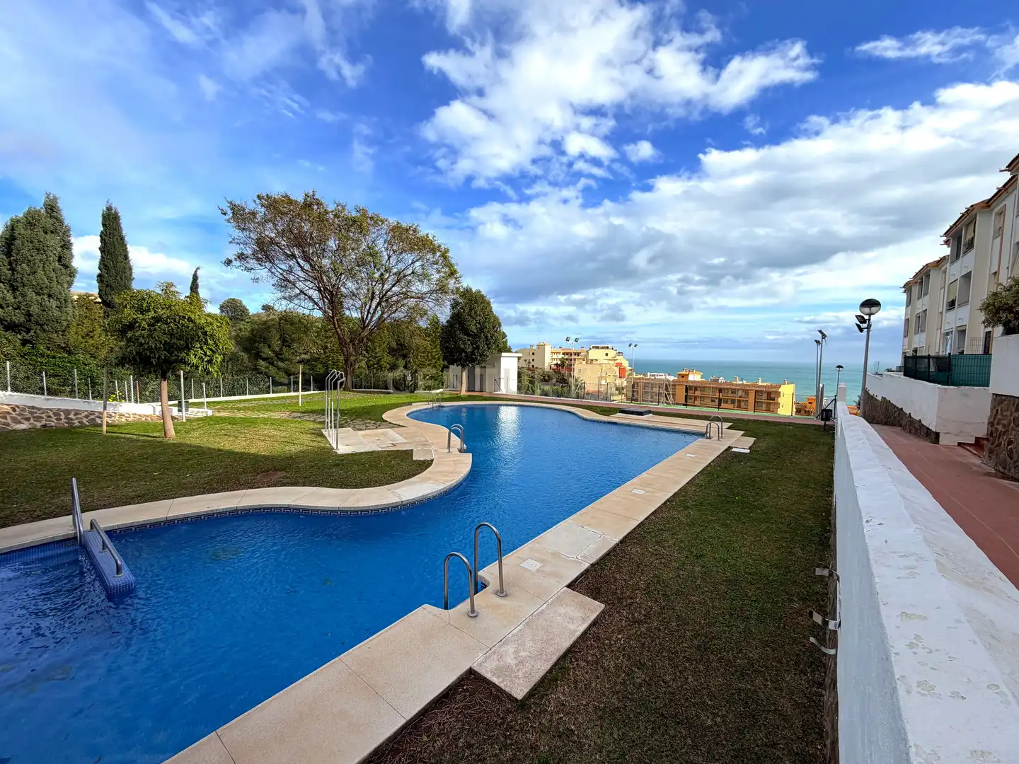 Swimming pool of Flat for sale in Benalmádena  with Air Conditioner, Storage room and Oven