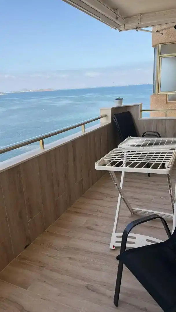 Terraza de Piso de alquiler en La Manga del Mar Menor con Jardín privado, Piscina y Amueblado