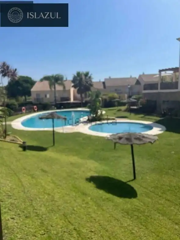 Garten von Einfamilien-Reihenhaus zum Verkauf in Islantilla mit Privatgarten, Terrasse und Abstellraum