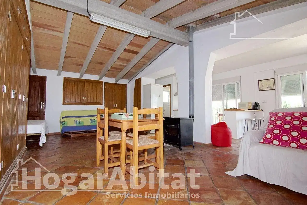 Sala d'estar de Casa o xalet en venda en Oliva amb Aire condicionat, Jardí privat i Terrassa