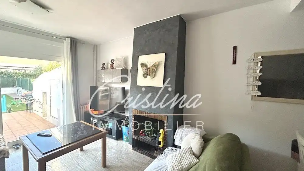 Sala d'estar de Casa adosada en venda en Santa Cristina d'Aro amb Calefacció i Jardí privat