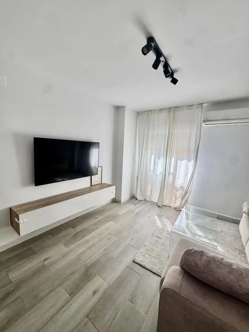 Sala de estar de Piso en venta en Castilleja de la Cuesta con Aire acondicionado y Calefacción