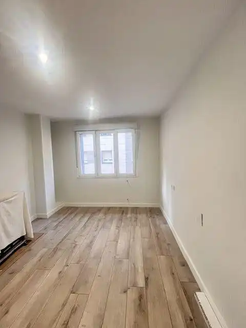 Bedroom of Flat for rent in Gijón   with Heating