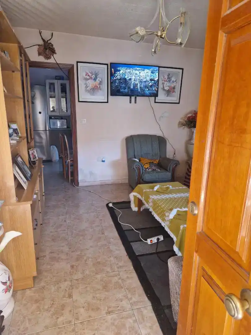 Sala d'estar de Casa adosada en venda en Atarfe amb Balcó